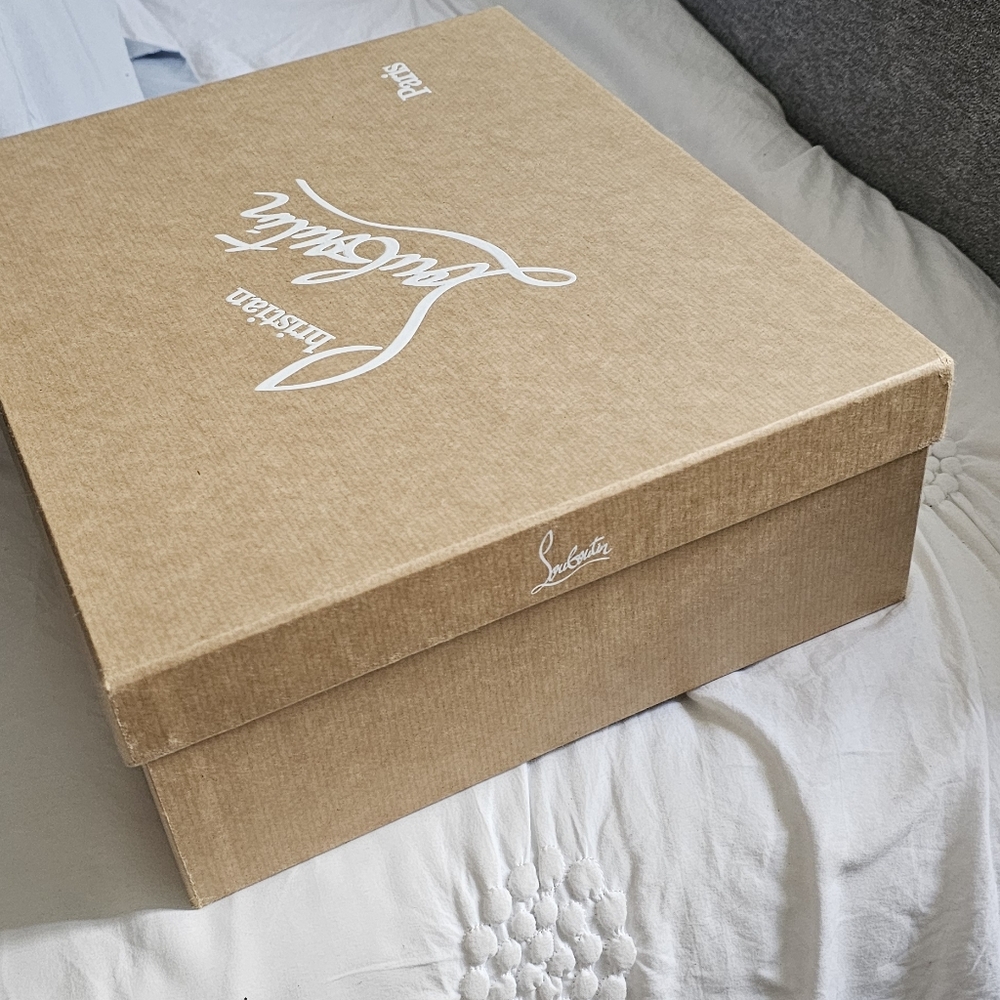 Empty Louboutin shoe box